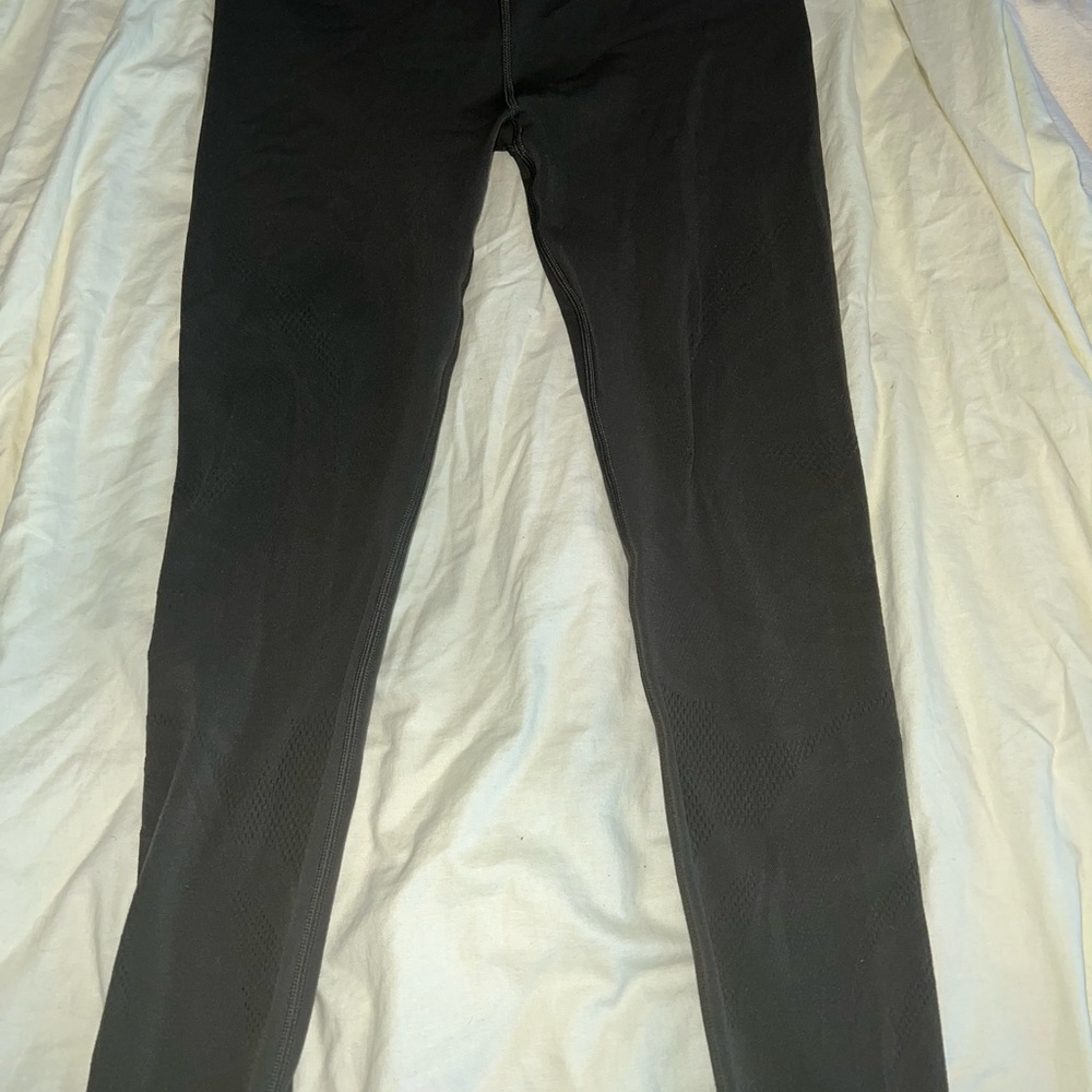 LULULEMON OLIVE leggings with breathable mesh cutouts at bottom